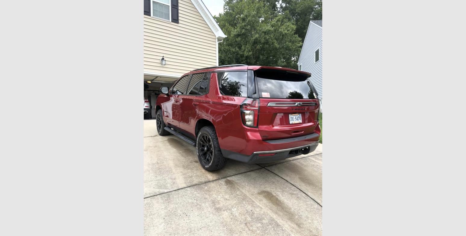 Boone Mobile Detailing's freshly detailed red SUV parked in a Midlothian, VA driveway